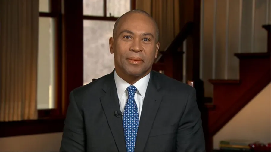 Former Governor Deval Patrick Climbing a Staircase