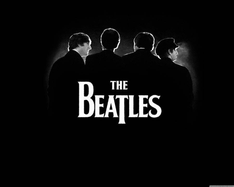 The Beatles with its classic logo in a plain black backdrop.