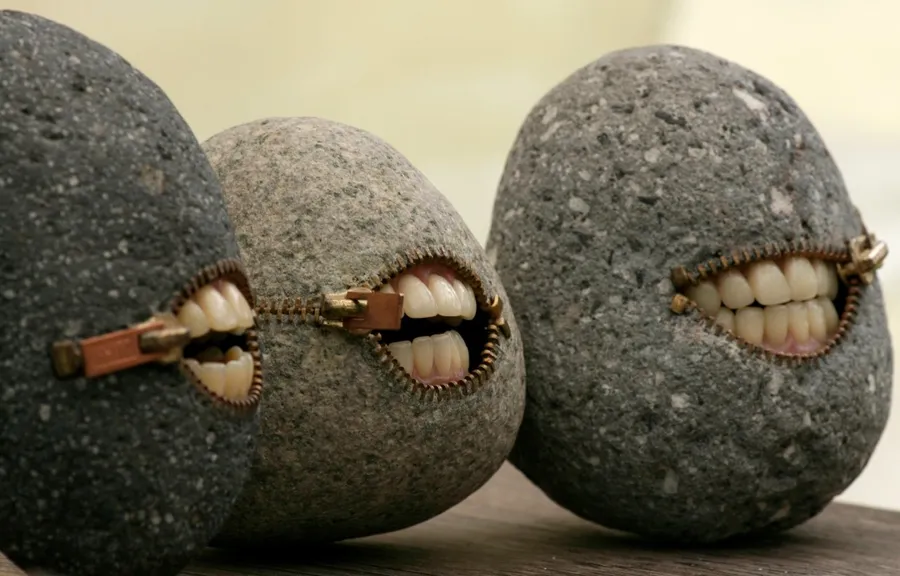 Weird stones with mouth wallpaper