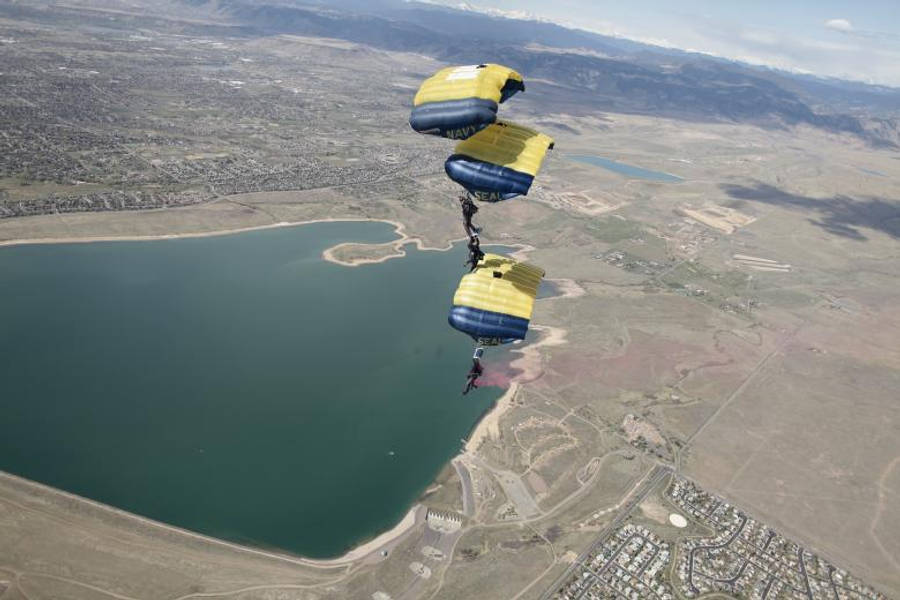 Three U S Navy Blue Angels Parachuters In Formation