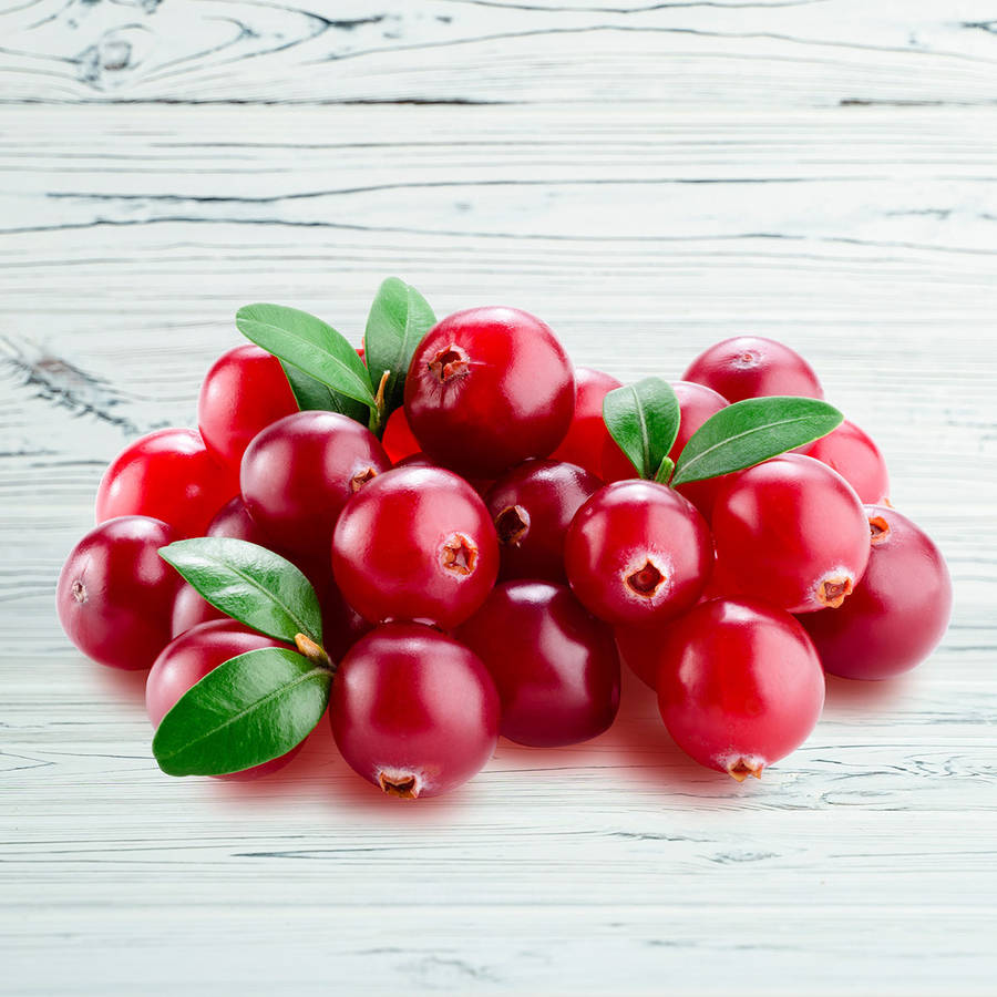Cranberriesrosse su un tavolo di legno