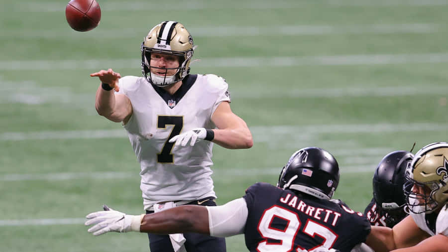 Ação do Quarterback Taysom Hill