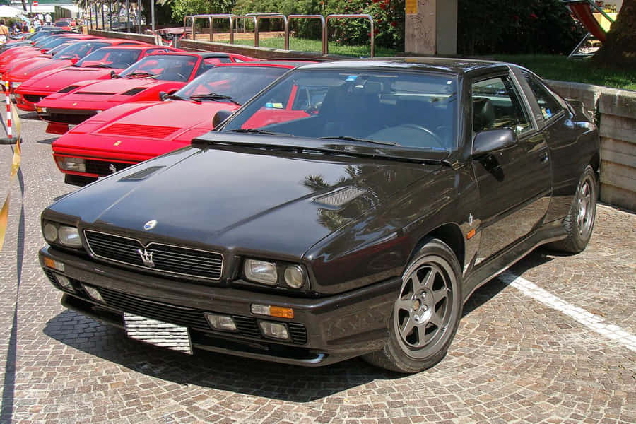 Maserati Shamal Parcheggiata tra Ferrari