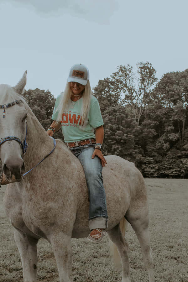 Landmädchen beim Reiten