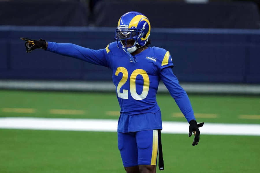 Cornerback em Ação com Uniforme dos Rams