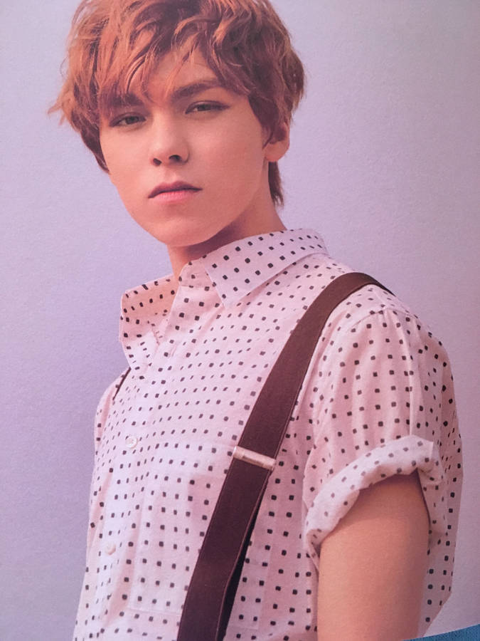 Download Vernon Wearing Suspenders Wallpaper | Wallpapers.com