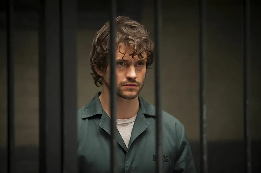 Hugh Dancy behind bars wallpaper