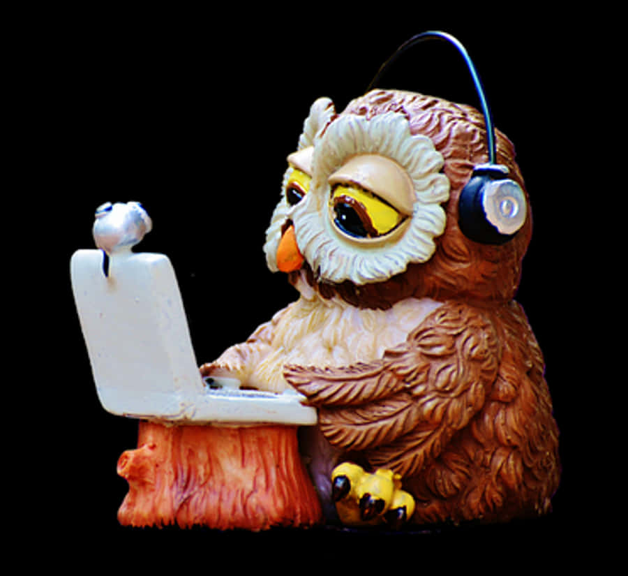 Owl Using Laptop Figurine