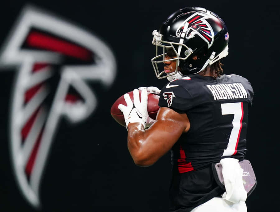 Atlanta Falcons Spieler Robinson fängt Football