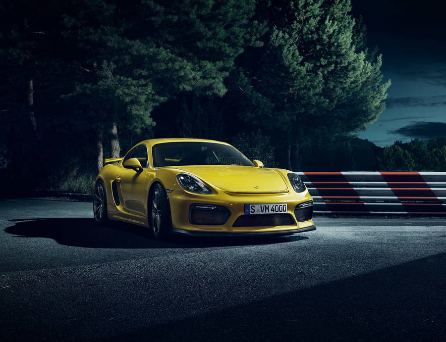 Yellow Porsche Cayman night shot wallpaper