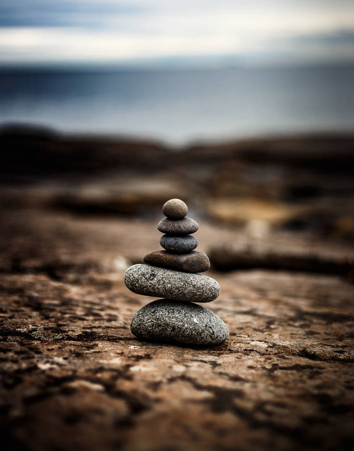 Download Zen Balanced Stones Wallpaper | Wallpapers.com