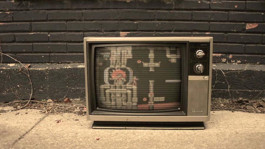 Vintage Fernseher gegen Ziegelwand