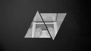 Hands typing on a laptop inside a triangular frame against a starry background. — Coding Picture