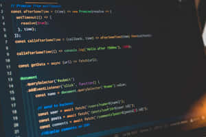 Close-up of glowing code on a computer screen with a blurred hand nearby. — Desktop 4K Background