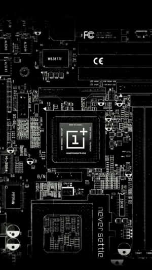 Close-up of a OnePlus motherboard with visible circuitry and component labels.