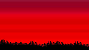 Red sky silhouettes a glowing city skyline at dusk. — Aesthetic Red Pc Picture