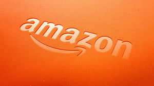 Amazon-Logo auf orangefarbener strukturierter Oberfläche mit lächelndem Pfeil geprägt — Amazon Prime Wallpaper