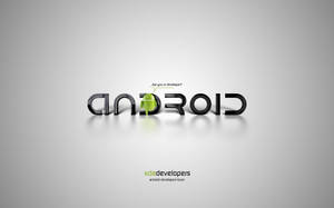 Mascote robô Android verde espreitando por trás da palavra Android em um fundo cinza. — Desenvolvedor Android Papéis de Parede