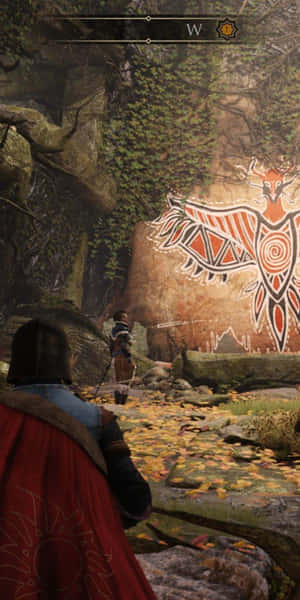 Krigare i röd mantel betraktar gammal tribal fågelmural på klippsida i höstskog. — Android Greedfall Bakgrund Bakgrunder