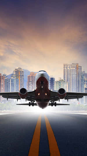 Airplane taking off from runway against city skyline at sunset. — Airplane Background