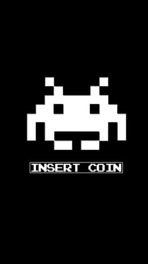 Nave espacial alienígena pixelada con texto insert coin sobre fondo negro. — Accesorios de juegos Fondos de pantalla