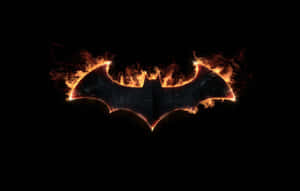 A burning bat logo with orange flames against a black background. — Bat Wallpaper