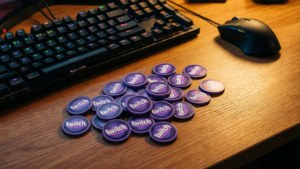 Twitch bits on a gaming desk wallpaper.