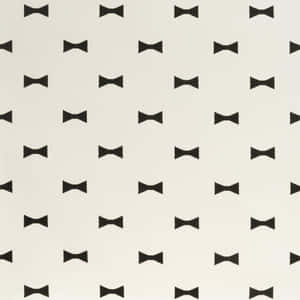 Cremefarbener Hintergrund mit sich wiederholendem schwarzen Fliegenmuster. — Bow Aesthetic Wallpaper