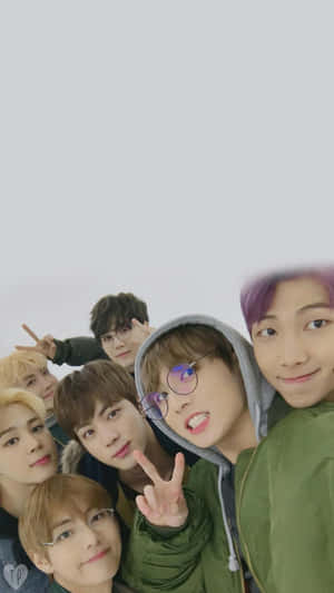 Seven young men with colorful hair and glasses smiling and posing for a selfie. — Bts iPhone Wallpaper