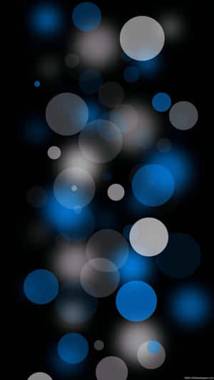 Floating blue and white light circles on a black background — Aesthetic Bubbles Picture