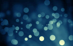 Glowing orbs float in a deep blue bokeh field creating a dreamy atmosphere. — Aesthetic Bubbles Picture