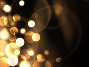 Soft golden lights blur into glowing orbs against a dark background. — Aesthetic Bubbles Picture