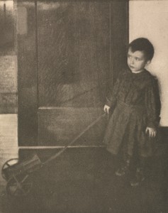 Camera Work: Boy with Wagon by Clarence H. White, created 1908, in photogravure. Download this artwork as a high-resolution wallpaper for desktop, tablet, or mo