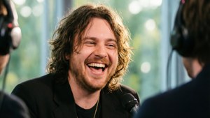 Lewis Capaldi laughing during an interview, candid moment