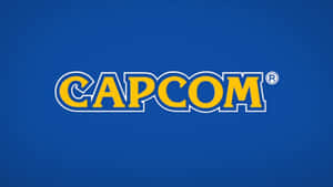 Capcom logo in yellow with white outline on blue background — Capcom Picture