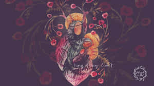 A crowned heart figure surrounded by red poppies and vines with text reading king of my heart. — Catholic Desktop Picture