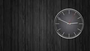 Minimalist wall clock with red second hand on dark wood background — Time Clock Background