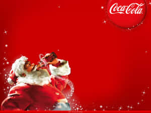 Santa Claus drinking Coca-Cola against a red sparkly background with logo. — Coca cola Wallpaper