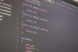 Close-up of C++ code on a computer screen with syntax highlighting. — Code Wallpaper