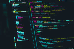 A computer screen showing a code editor with React and TypeScript code. — Code Wallpaper