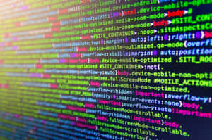 Colorful cascading lines of HTML and CSS code on a digital screen. — Coding Picture