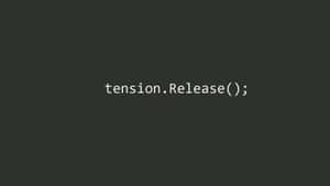 White programming code text tension.Release() on dark gray background — Coding Picture