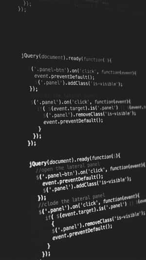 Close-up of glowing code on a dark screen showing JavaScript and jQuery syntax.