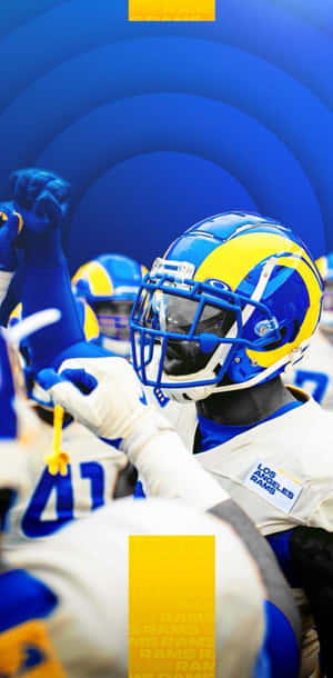 Los Angeles Rams football players in blue and yellow gear emerging from a tunnel.