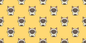 Yellow background with repeating cute cartoon cat faces. — Pattern Desktop Picture