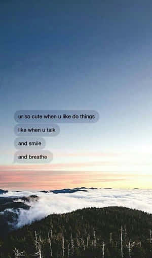 Mountain peak above clouds at sunrise with romantic text bubbles. — Cool Halo Picture