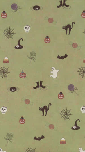 Halloween-themed wallpaper with spooky icons on green background.