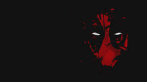 A stylized Deadpool face with glowing eyes and red splatter against black background. — Deadpool Logo Picture