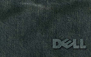 Dell logo stitched on dark denim fabric texture. — Blue Desktop Wallpaper