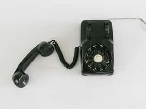 Vintage black rotary telephone on white background — 4K Phone Background